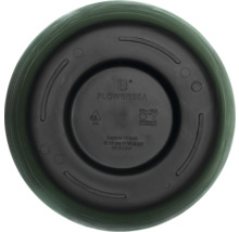 Unterseite eines Blumentopfes mit Bohrlöchern zur Entwässerung