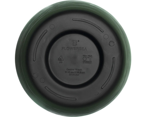 Unterseite eines Blumentopfes mit Bohrlöchern zur Entwässerung