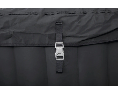 Gros plan d'un couvercle de jacuzzi noir avec une fermeture