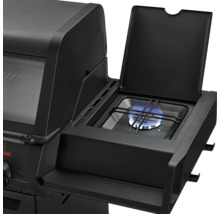 Vue détaillée d'un barbecue à gaz noir avec brûleur latéral et couvercle ouvert