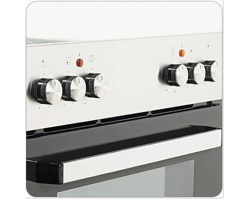 Gros plan d'une cuisinière avec des boutons rotatifs pour régler la température