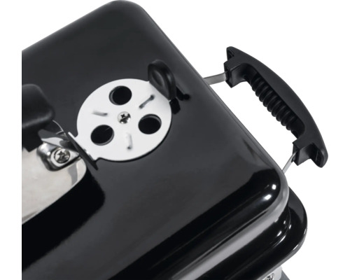 Vue détaillée d'un barbecue à charbon de bois avec curseur d'aération et poignée