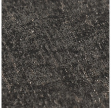 Gros plan d'une surface sombre et texturée