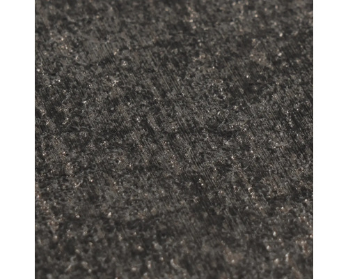 Gros plan d'une surface sombre et texturée