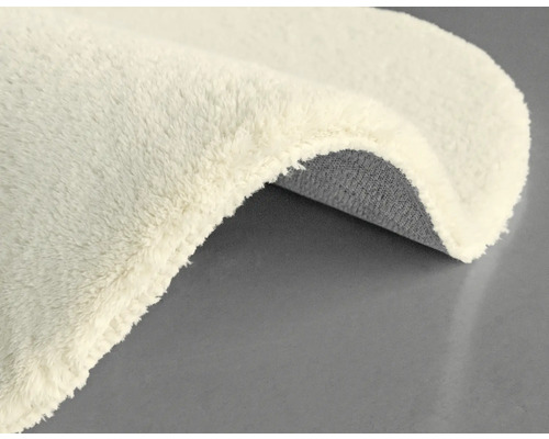 Tapis avec poils et envers tissé
