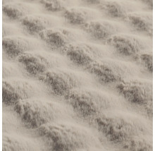Gros plan d'une surface textile structurée