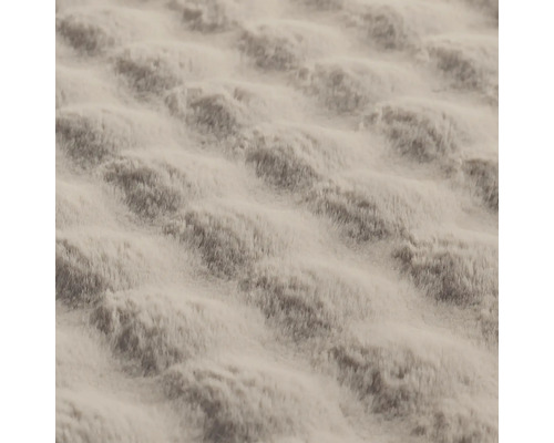 Gros plan d'une surface textile structurée