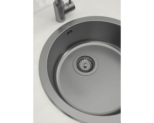 Runde Küchenspüle mit Ablaufgarnitur und Wasserhahn