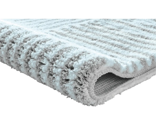 Tapis à poils longs avec motif à rayures