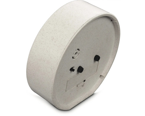 Dos d'une horloge à quartz avec boutons de réglage