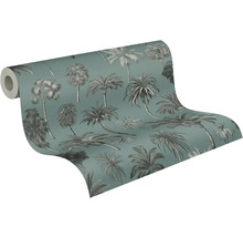 Papier peint intissé avec motif de palmiers tropicaux de style illustré sur un rouleau partiellement déroulé.