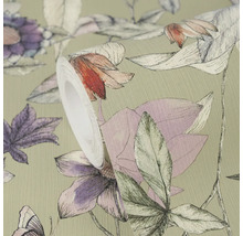 Rouleau de papier peint intissé avec un motif floral représentant des croquis détaillés de fleurs et de feuilles sur une surface texturée.