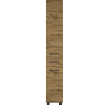 Armoire de salle de bain haute et étroite aspect chêne avec une porte, trois tiroirs et des poignées noires.