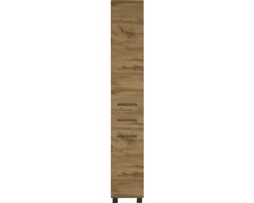 Armoire de salle de bain haute et étroite aspect chêne avec une porte, trois tiroirs et des poignées noires.