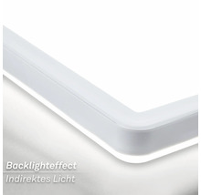 Gros plan d'un plafonnier LED blanc avec éclairage indirect