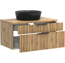 Badmöbel-Set mit Unterschrank in Eichenoptik, Lamellenfront, zwei Schubladen und rundem, schwarzem Aufsatzwaschbecken.