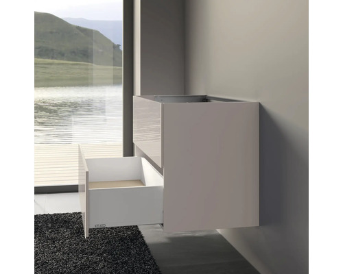 Meuble sous-lavabo avec tiroir sur un mur de salle de bain