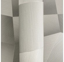 Papier peint intissé avec motif géométrique moderne de triangles et structure de lignes fines.