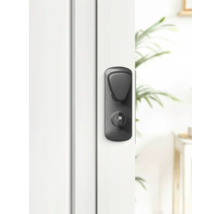 Schwarzer Türdrücker an weisser Tür