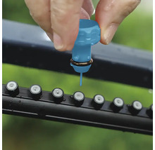 L'irrigation goutte à goutte est connectée au distributeur