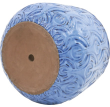 Pot de fleurs bleu avec trou au fond