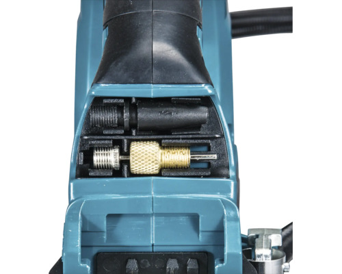 Vue détaillée du compartiment à accessoires d'un compresseur sans fil avec aiguille à ballon et adaptateur de valve.