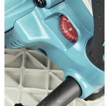 Vue détaillée d'un outil électrique Makita turquoise avec une molette rouge de réglage de la vitesse et une échelle numérotée.