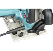 Détail de la scie plongeante turquoise avec plaque de base, boutons de réglage noirs, molette de vitesse rouge et raccord pour aspiration.