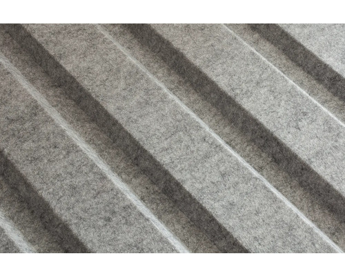 Gros plan d'un panneau acoustique plié en feutre