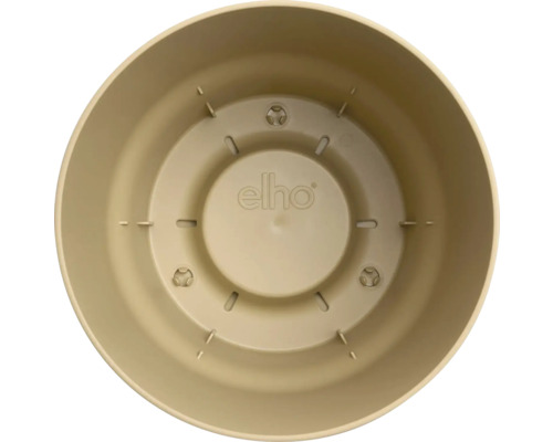 Vue intérieure d un pot de fleurs rond en plastique avec orifices de drainage et elho Logo.