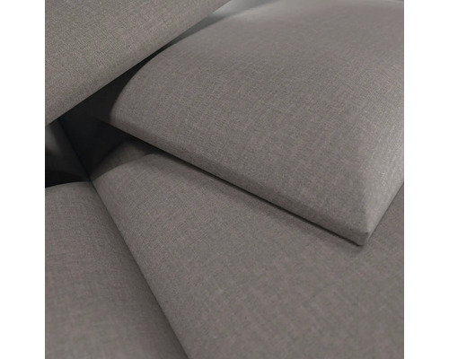 Vue détaillée du revêtement en tissu tissé gris de coussins.