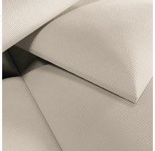 Gros plan d'un tissu en velours côtelé clair.