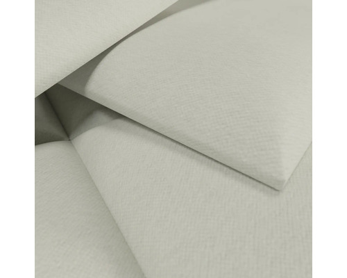 Vue détaillée d'un papier peint clair et texturé avec une structure de surface fine.