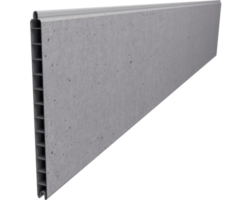 Panneau mural aspect béton avec profilé alvéolaire et assemblage à rainure et languette.