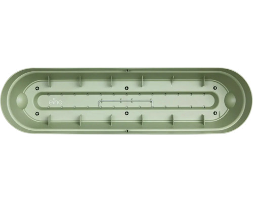 Jardinière Elho en plastique avec trous de drainage et barre métallique, vue intérieure.