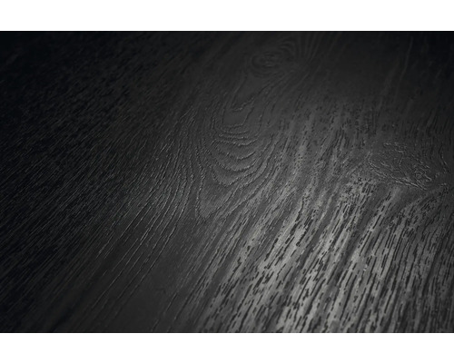 Gros plan d une surface de sol foncée avec une structure en bois, un grain visible et des nœuds.