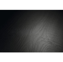 Gros plan d une surface avec une structure en bois foncé et un grain palpable.