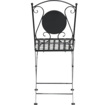 Chaise de bistrot pliante noire en métal avec dossier décoré et assise à claire-voie.