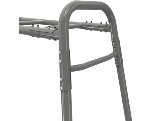 Vue détaillée d'une structure métallique grise avec des raccords de tubes robustes et des boulons.