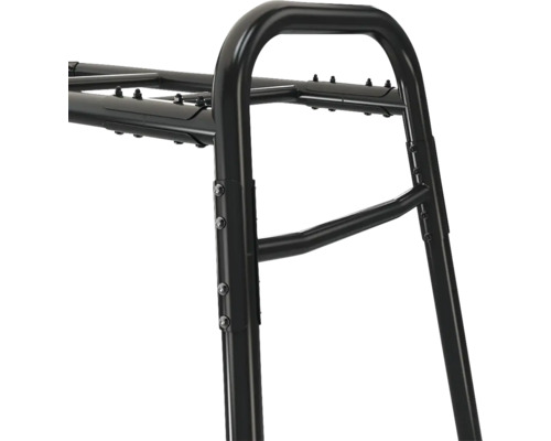 Vue détaillée d'un cadre métallique noir avec des raccords boulonnés robustes pour une étagère de rangement.