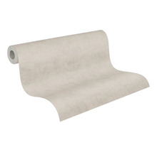 Rouleau de papier peint avec une structure de crépi discrète en beige clair.