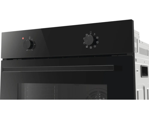 Four encastrable avec façade en verre noir, deux boutons rotatifs pour la température et les fonctions de cuisson et une poignée noire.
