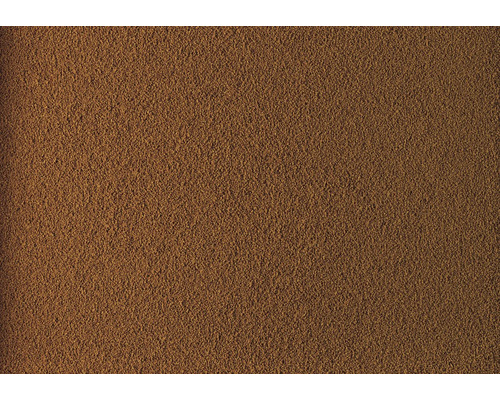 Surface texturée d'un enduit mural décoratif brun avec une structure granulaire fine.