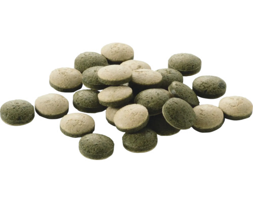 Zweifarbige Futtertabletten für Aquariumfische.