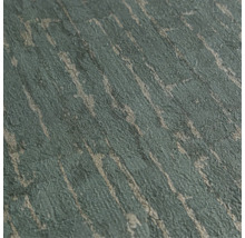 Gros plan d'un papier peint texturé avec des lignes métalliques scintillantes et une surface organique ressemblant à de la pierre.