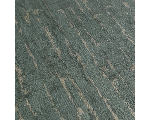 Gros plan d'un papier peint texturé avec des lignes métalliques scintillantes et une surface organique ressemblant à de la pierre.