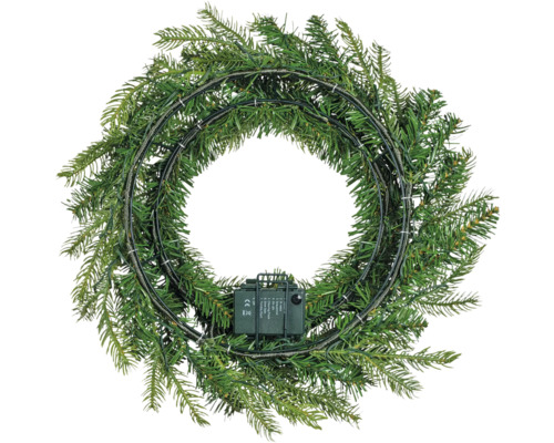 Couronne de Noël artificielle, vue de derrière avec structure métallique et boîtier à piles.