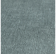 Gros plan d une surface structurée avec un aspect textile fin et une structure tissée verticale.