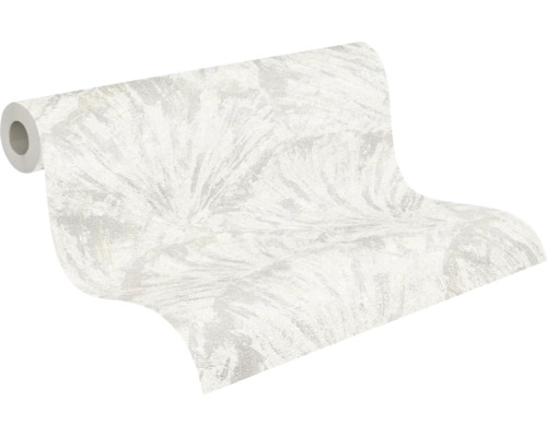 Papier peint intissé avec motif de feuilles abstrait dans des tons clairs, légèrement structuré.