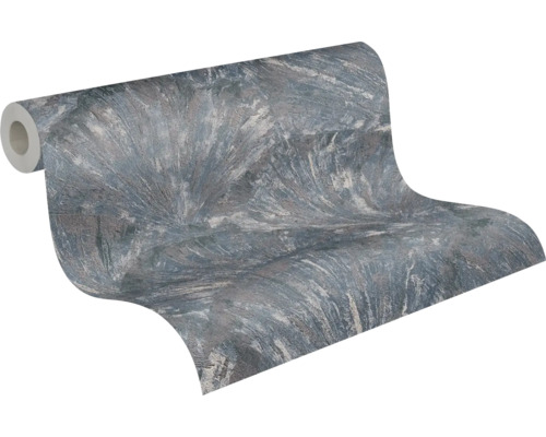 Papier peint intissé en rouleau avec aspect pierre structuré et effet marbre en gris et bleu.